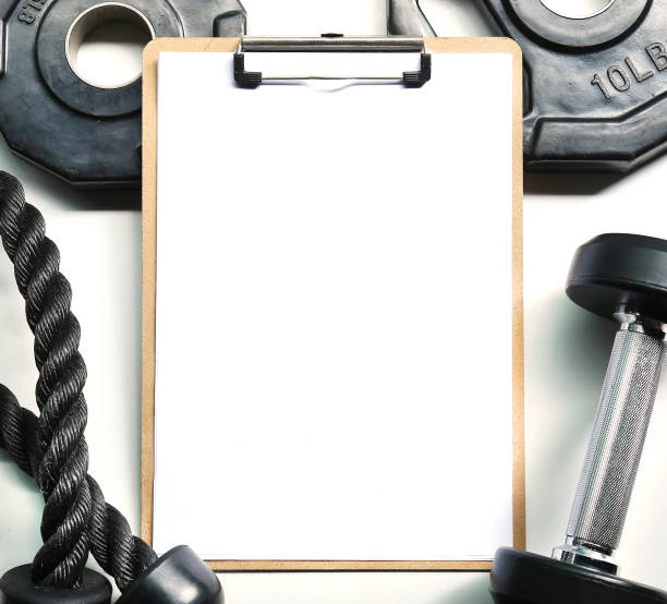 istock Mockup template clipboard with gym equipment 808114158