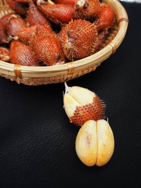 istock Snake fruits on black background 808133502