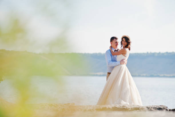istock Wedding couple on beautiful landscape. 808138738