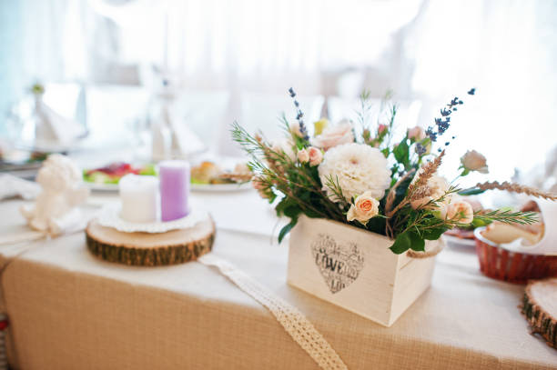 istock Fantastic flower compositions laying on a wedding table. 808148590