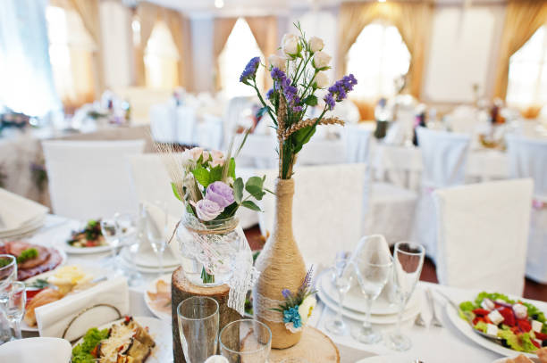 istock Fantastic flower compositions laying on a wedding table. 808150000