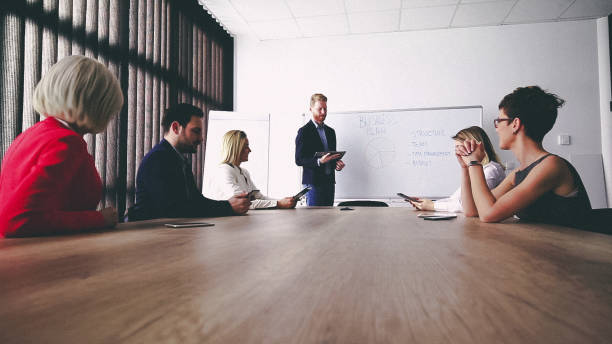 istock Business man presenting new ideas and projects to his team 808158342
