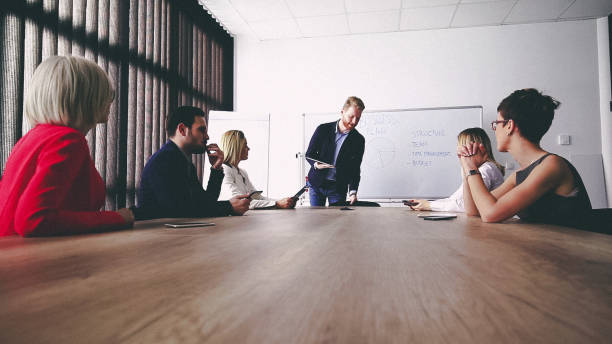 istock Business man presenting new ideas and projects to his team 808158382