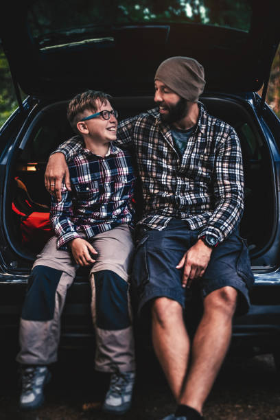 istock Father and son travelling by car 808211646