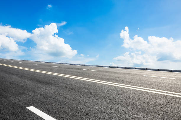 istock Asphalt road and sky cloud landscape 808226328