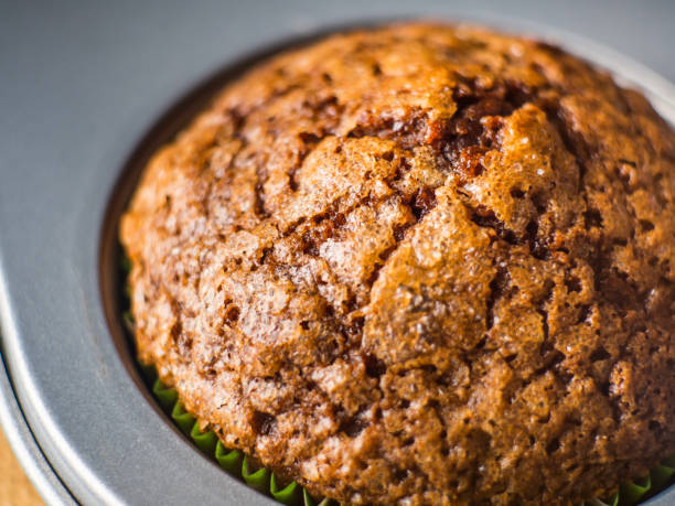 istock Banana chocolate muffin with caramel sugar topping 808235590