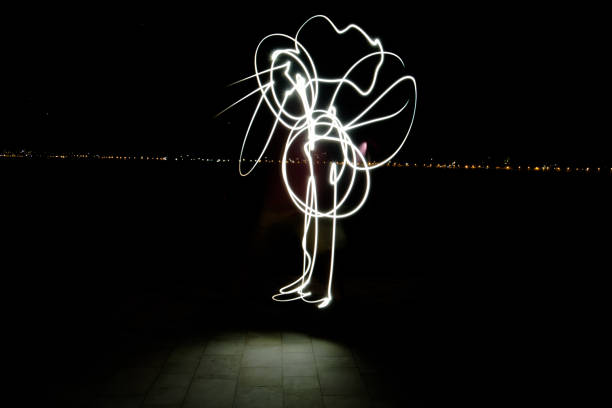 istock Painting with light by the sea 808236922