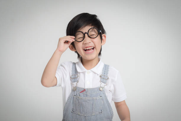 istock Happy Asian child wearing glasses smiling 808239436
