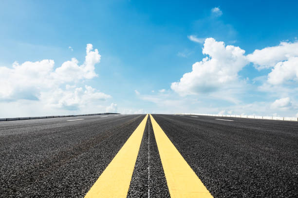 istock Asphalt road and sky cloud landscape 808244574