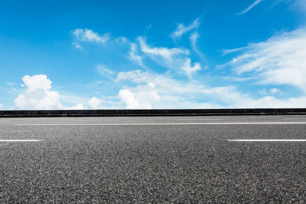 istock Asphalt road and sky cloud landscape 808339118