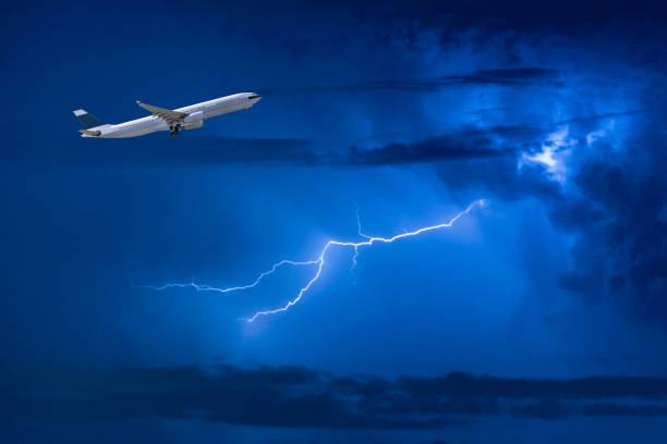 istock Commercial airplane take off flying over storm clouds and lightning 808339846