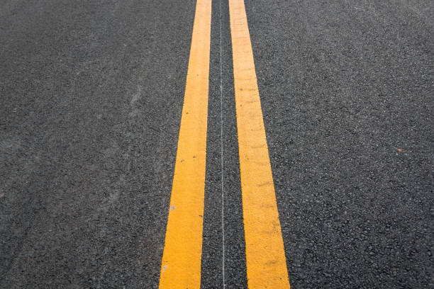 istock Asphalt road with yellow double line 808350732