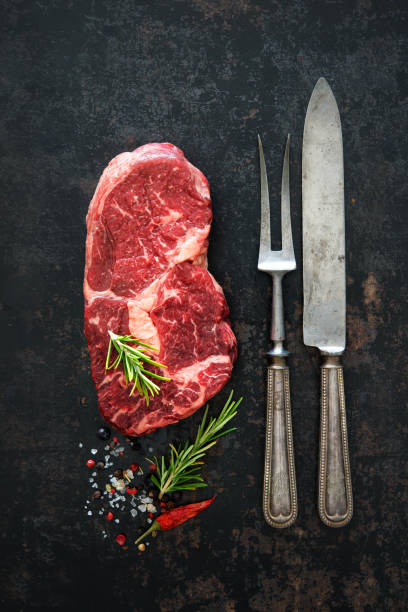 istock Raw dry aged beef ribeye steak 808351102