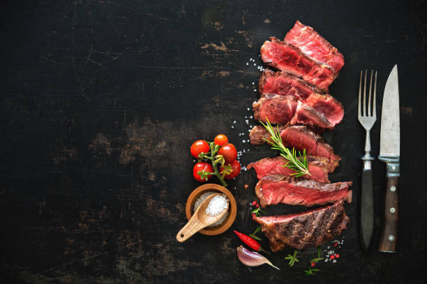 istock Sliced medium rare grilled beef ribeye steak 808351106