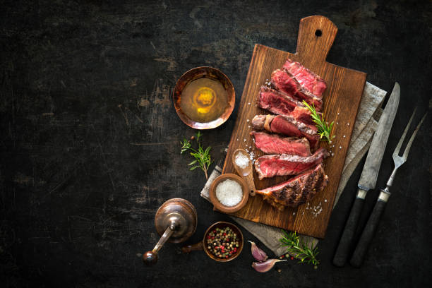 istock Sliced medium rare grilled beef ribeye steak 808351108