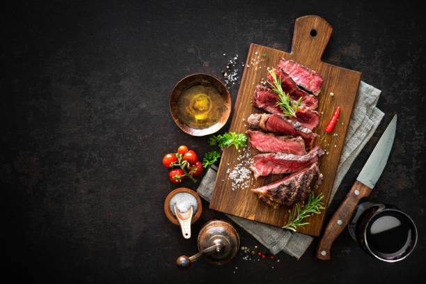 istock Sliced medium rare grilled beef ribeye steak 808351114