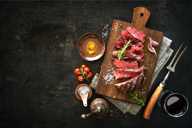 istock Sliced medium rare grilled beef ribeye steak 808351132