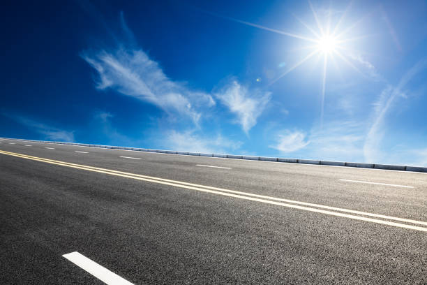 istock Asphalt road and sky cloud landscape 808352412