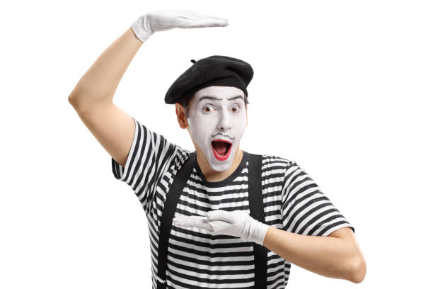 Mime artist gesturing with his hands Mime artist gesturing with his hands isolated on white background mime artist stock pictures, royalty-free photos & images