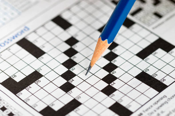 istock Crossword Puzzle and Pencil 808410916
