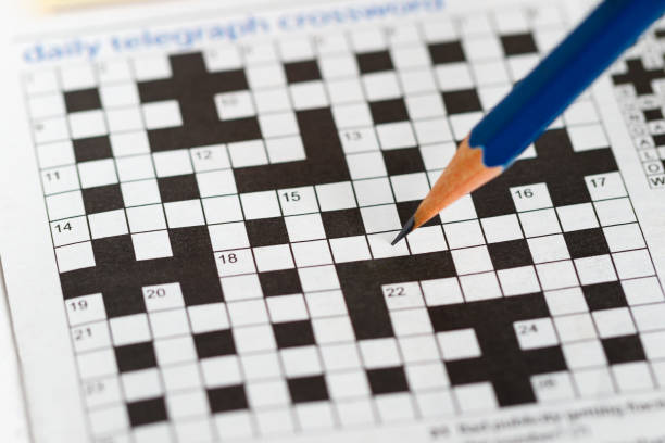 istock Crossword Puzzle and Pencil 808411018