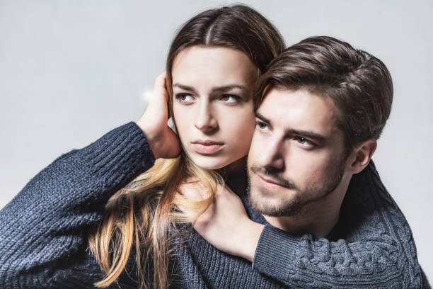 istock beautiful young couple embraced 808419950