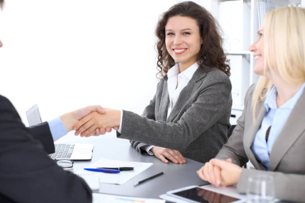 istock Business people shaking hands at meeting 808426358