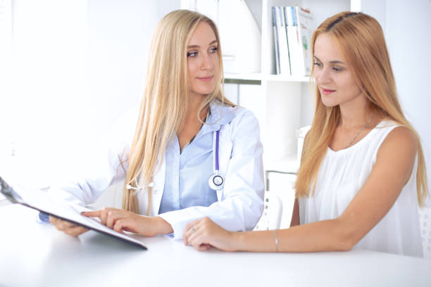 istock Doctor with patient in hospital 808427242