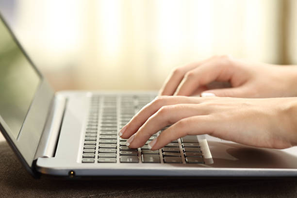 istock Woman hands typing on a laptop keyboard 808452560