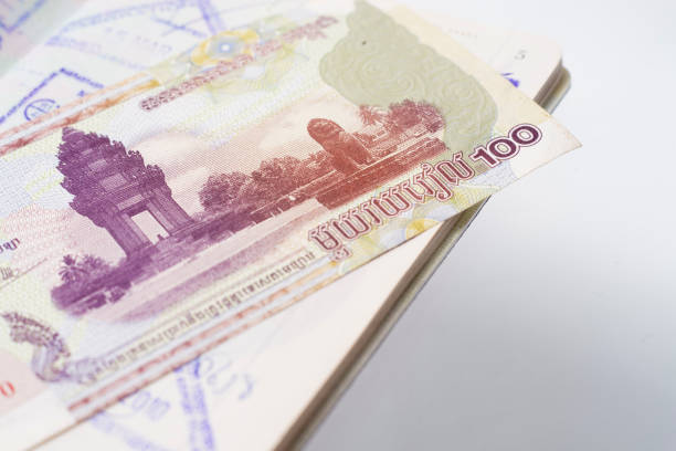 istock Thai passport with Cambodia money 808452982