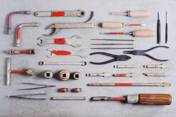 istock A set of old tools for the professional mechanic over gray concrete background 808513546
