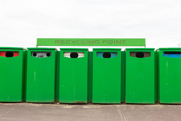 istock Six green recycling bins by recycling point 808520130