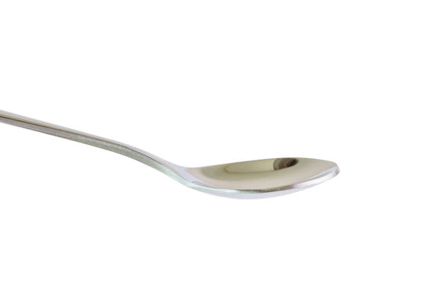 istock Silver spoon isolated on white background, luxury utensil in kitchen. 808540876