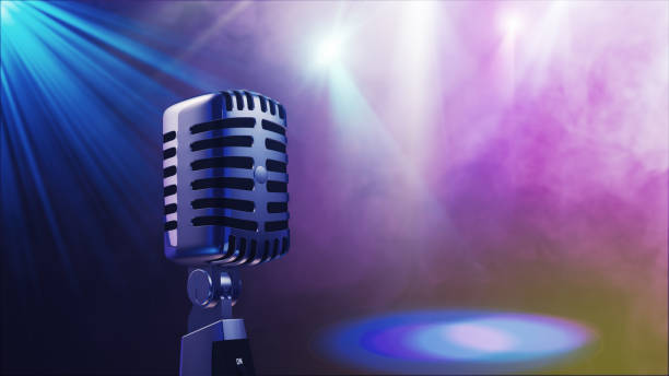 istock Retro style microphone on stage in the spotlight performance of the musical group. Microphone for rock, rock'n'roll and rockabilly music. 3d illustration 808551728