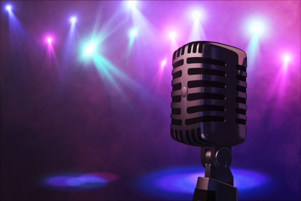 istock Retro style microphone on stage in the spotlight performance of the musical group. Microphone for rock, rock'n'roll and rockabilly music. 3d illustration 808551744