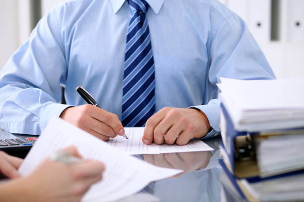 istock Bookkeepers or financial inspector making report, calculating or checking balance. Audit concept. 808562794