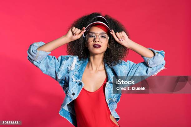 Fashion Portrait Of 80s Style Young Woman Weraign Worn Denim Jacket Stock Photo - Download Image Now