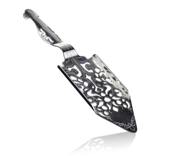 Stainless Steel Absinthe Spoon isolated Stainless Steel Absinthe Spoon isolated on white background with reflection absinthe spoon stock pictures, royalty-free photos & images