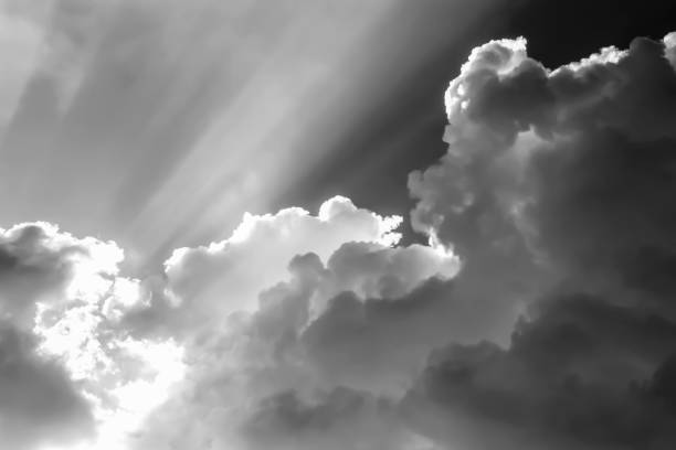 Photo of Dramatic sunlight of  sky and clouds in Black and White.