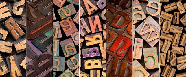 alphabet in vintage letterpress wood type printing blocks - a collage of different fonts and styles