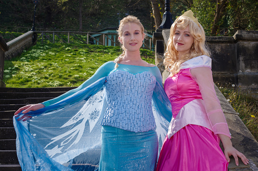 Cosplayers dressed as 'Princess Elsa' from Frozen and 'Princess Aurora' from Sleeping Beauty at Sci-Fi Scarborough.