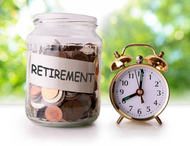 istock Coins in glass jar for retirement 808669306
