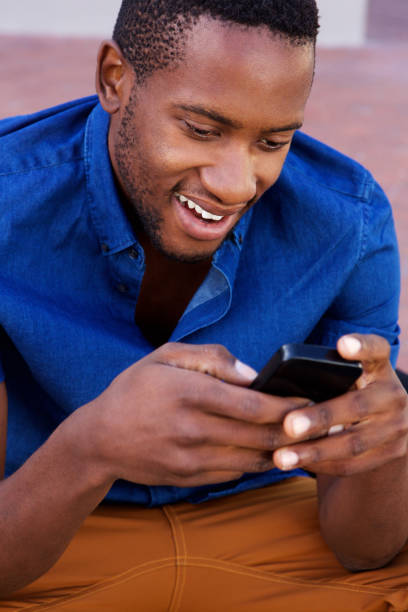 istock African american man using mobile phone 808669754