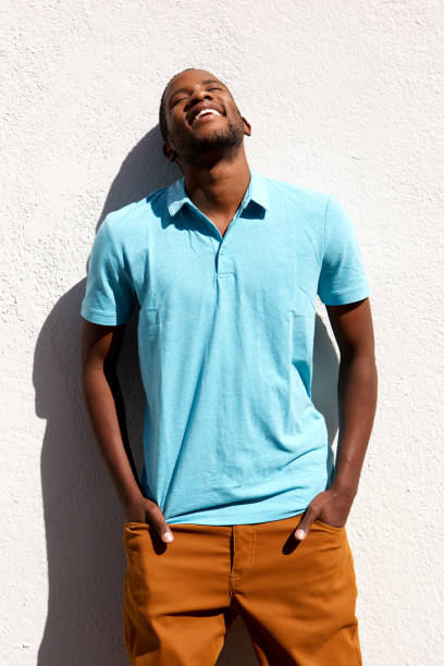 istock Relaxed young african man standing with his hands in pocket 808670028