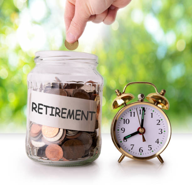istock Coins in glass jar for retirement 808671738