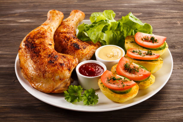 istock Roast chicken leg and vegetables 808692516