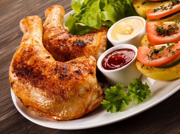 istock Roast chicken leg and vegetables 808701440