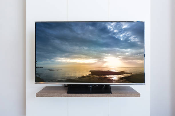 istock TV television, Sea scape on screen white wall background. 808704538