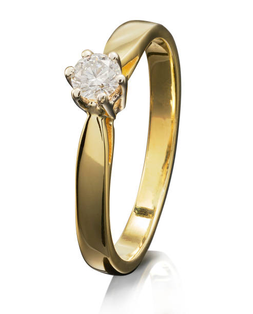 istock Golden ring with gemstone isolated on white background 808705194