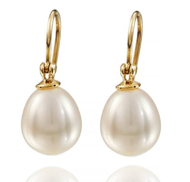 istock Golden earrings with gemstone isolated on white background 808715882